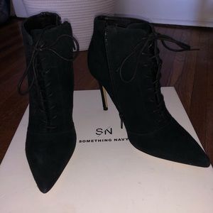 Something Navy lace up black booties, size 6.